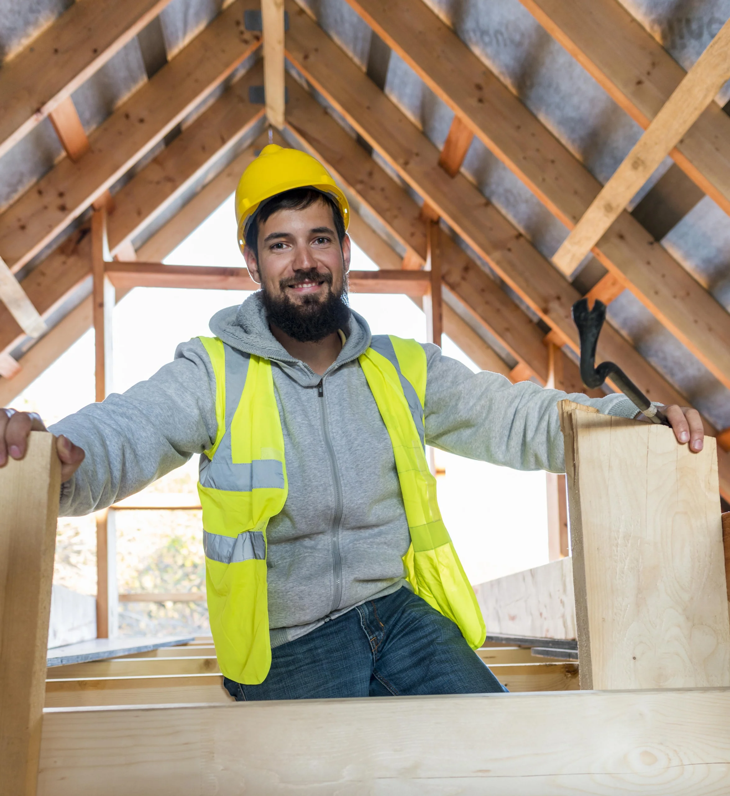 front-view-carpenter-man-sitting-smiling portrait woman with laptop working smiling